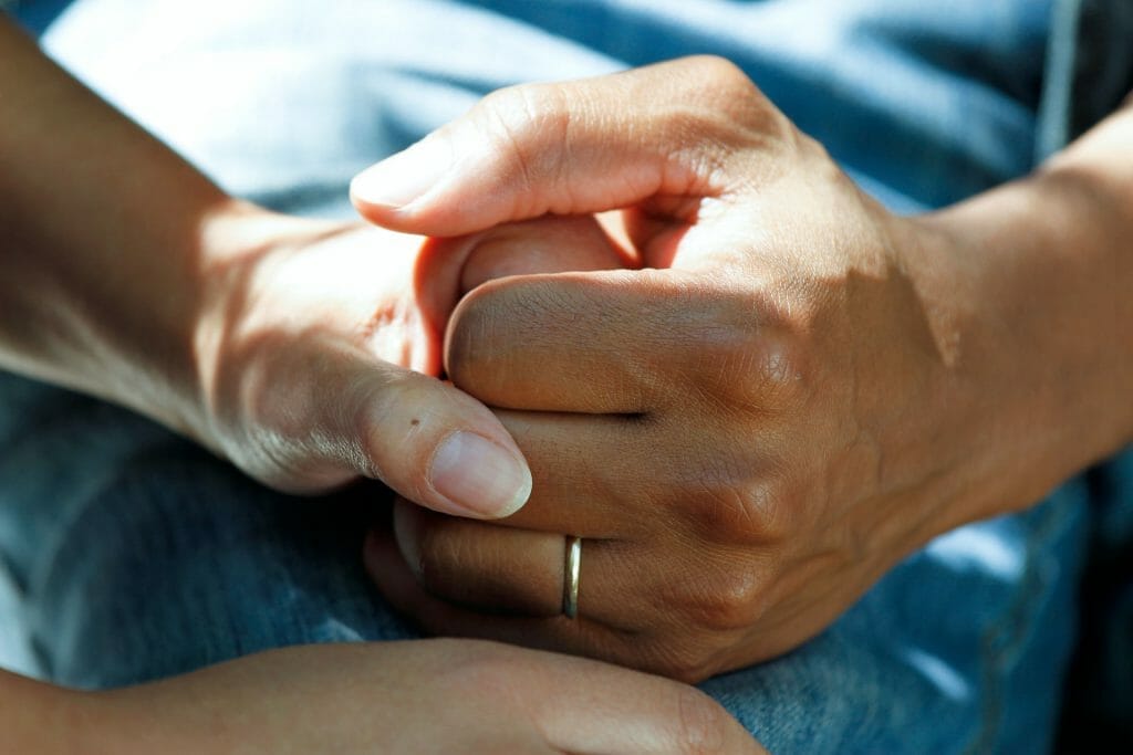 holding hands with life threatening condition